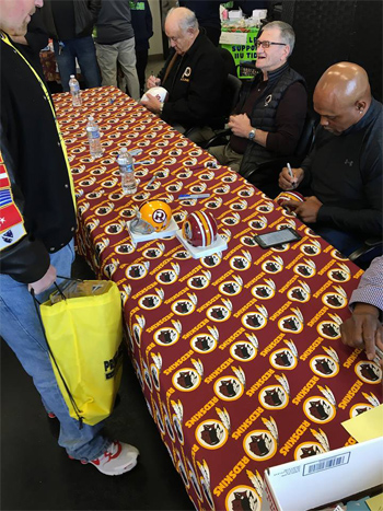 Toys For Tots signing